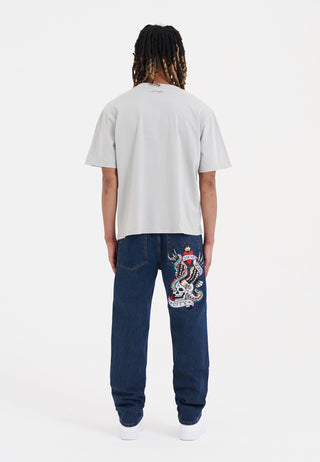 Pantalon en jean à imprimé graphique Nyc-Skull Tattoo - Indigo